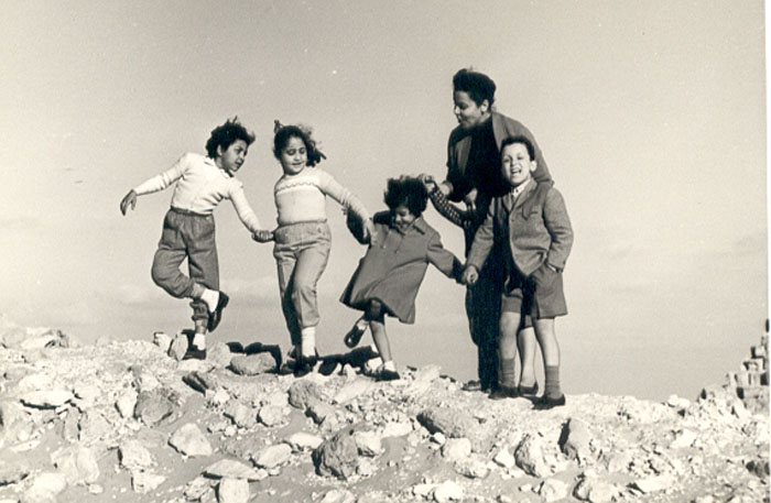 Khyrieh+kids on rocks