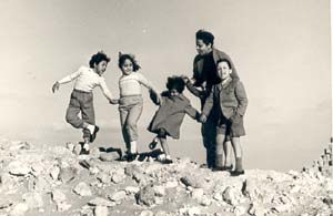Khyrieh+kids on rocks